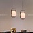 Серия подвесных светильников со стеклянными матовыми плафонами эллиптической формы внутри сетчатого абажура KIOTO A фото 6