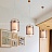 Серия подвесных светильников со стеклянными матовыми плафонами эллиптической формы внутри сетчатого абажура KIOTO фото 9