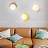Серия настенных светильников с белым шарообразным плафоном и декоративным цветным элементом ORSA фото 10