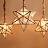 Дизайнерский подвесной светильник со стеклянным плафоном в форме многоконечной звезды MAGIC фото 9